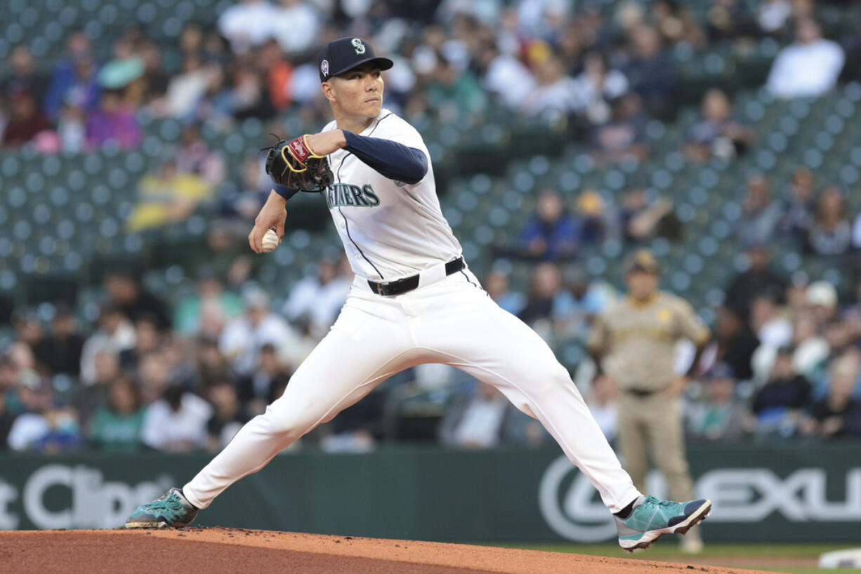 Seattle Mariners starting pitcher Bryan Woo throws during the first inning of a baseball game against the San Diego Padres, Wednesday, Sept. 11, 2024, in Seattle.