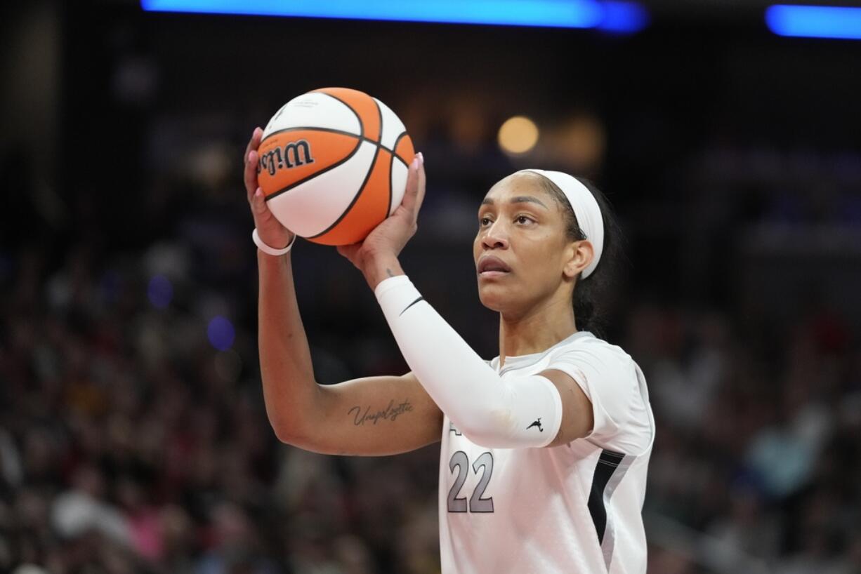 Las Vegas Aces' A'ja Wilson shoots during the second half of a WNBA basketball game against the Indiana Fever, Wednesday, Sept. 11, 2024, in Indianapolis.