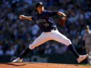 Seattle Mariners starting pitcher Logan Gilbert throws against the New York Yankees during the second inning of a baseball game Thursday, Sept. 19, 2024, in Seattle.