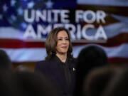 Democratic presidential nominee Vice President Kamala Harris listens as she joins Oprah Winfrey at Oprah's Unite for America Live Streaming event Thursday, Sept. 19, 2024 in Farmington Hills, Mich.