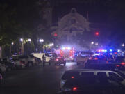 This image provided by WBMA shows police and emergency vehicles in the entertainment district after a shooting in Birmingham, Ala., Sunday, Sept. 22, 2024.