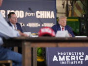 Republican presidential nominee former President Donald Trump listens during a campaign event at a farm, Monday, Sept. 23, 2024, in Smithton, Pa.