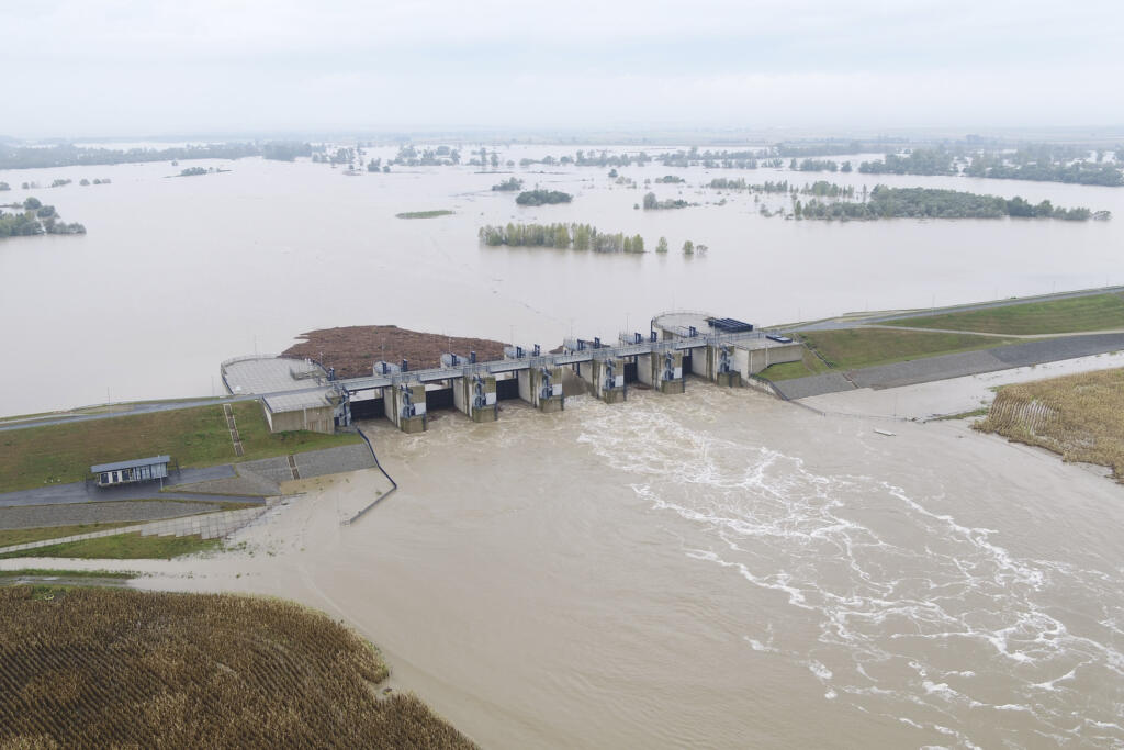 This photo provided by the state company Polish Waters shows the Oder River flood waters channelled into and contained by the newly-built Lower Raciborz Reservoir that has spared the cities of Opole and Wroclaw from flooding, in Raciborz, southwestern Poland, Sept. 16, 2024.