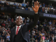 FILE - Retired Denver Nuggets center Dikembe Mutombo waves to the crowd as his jersey number was retired by the team during halftime of the Nuggets' NBA basketball game against the Portland Trail Blazers on Saturday, Oct. 29, 2016, in Denver.