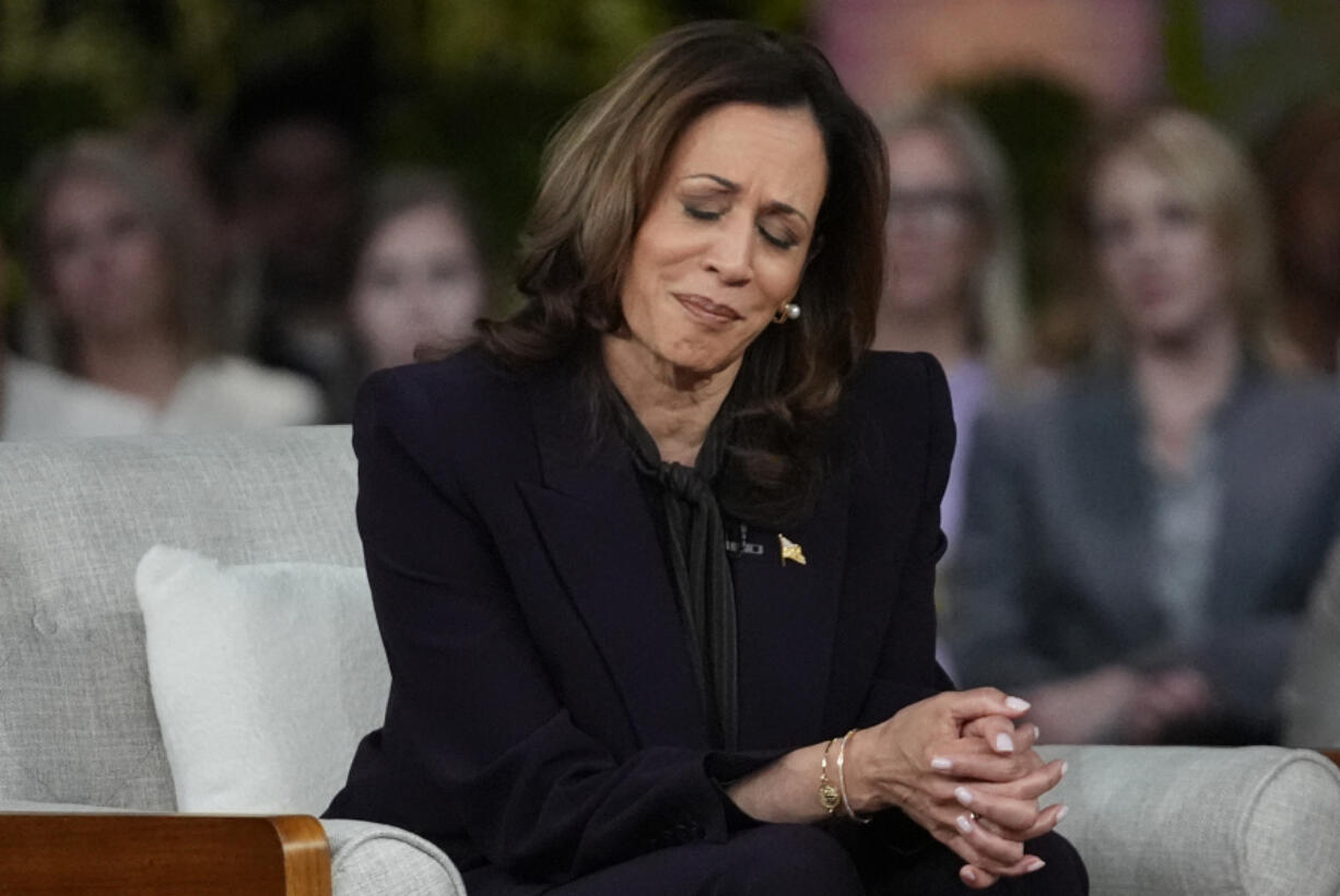 Democratic presidential nominee Vice President Kamala Harris listens to a parent&#039;s survivor story as she joins Oprah Winfrey at Oprah&#039;s Unite for America Live Streaming event Thursday, Sept. 19, 2024 in Farmington Hills, Mich.