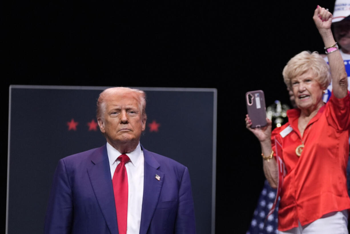 Republican presidential nominee former President Donald Trump arrives to speak about the tax code and manufacturing at the Johnny Mercer Theatre Civic Center, Tuesday, Sept. 24, 2024, in Savannah, Ga.