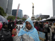 Families and friends take part in a demonstration marking the 10-year anniversary of the disappearance of 43 students from an Ayotzinapa rural teacher&rsquo;s college, in Mexico City, Thursday, Sept. 26, 2024.