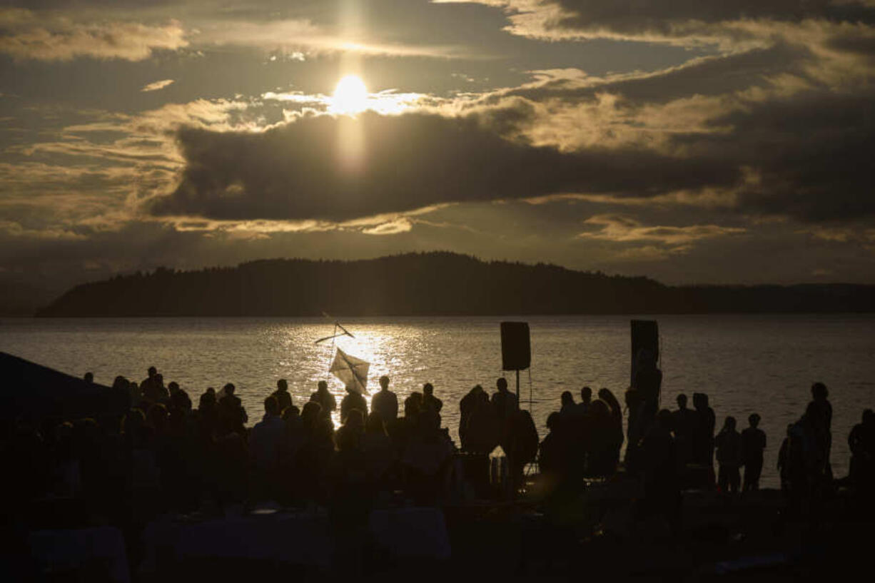 Attendees gather for a vigil on Alki Beach for the death of the 26-year old Aysenur Ezgi Eygi, killed recently in the occupied West Bank, Wednesday, Sept. 11, 2024, in Seattle. Eygi grew up in Seattle, attended Seattle Public Schools and graduated from the University of Washington.