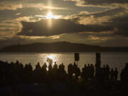 Attendees gather for a vigil on Alki Beach for the death of the 26-year old Aysenur Ezgi Eygi, killed recently in the occupied West Bank, Wednesday, Sept. 11, 2024, in Seattle. Eygi grew up in Seattle, attended Seattle Public Schools and graduated from the University of Washington.