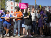 FILE - Arizona abortion-rights supporters gather for a news conference prior to delivering over 800,000 petition signatures to the capitol to get abortion rights on the November general election ballot, July 3, 2024, in Phoenix. (AP Photo/Ross D.