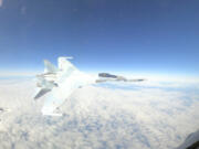 In this Sept. 23, 2024, image taken from video, a U.S. Air Force F-16 operating under the direction of North American Aerospace Defense Command, conducts a routine intercept of a Russian Tu-95 aircraft in the Alaskan Air Defense Identification Zone (ADIZ) when NORAD said a Russian Su-35 aircraft conducts an unsafe maneuver directed at the F-16.