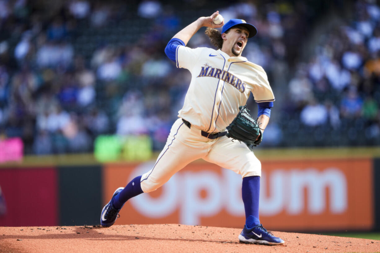 Seattle Mariners starting pitcher Logan Gilbert throws against the Oakland Athletics during the first inning Sunday in Seattle.