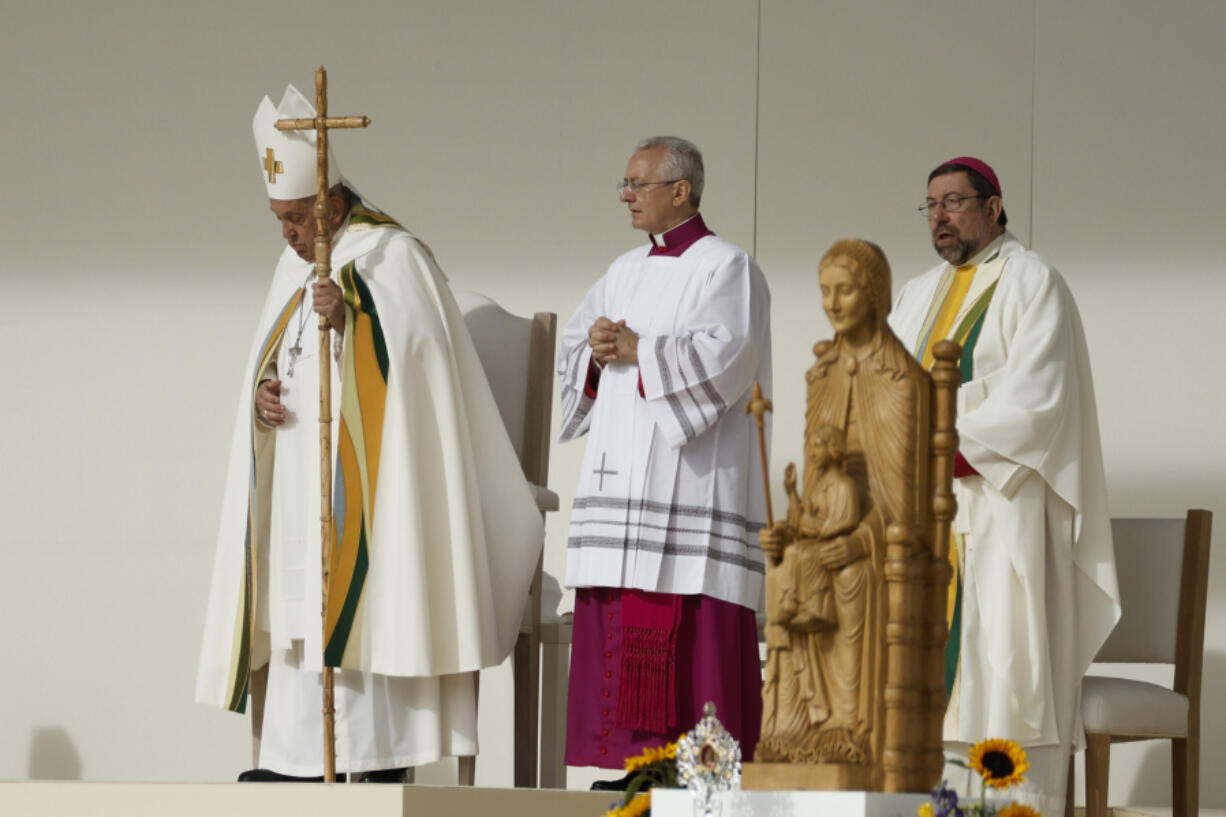 Pope Francis leaves at the end of the Sunday mass at King Baudouin Stadium, in Brussels Sunday, Sept. 29, 2024.