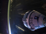 In this long-exposure photo provided by NASA, Boeing&rsquo;s Starliner spacecraft is docked to the Harmony module of the International Space Station on July 3, 2024.