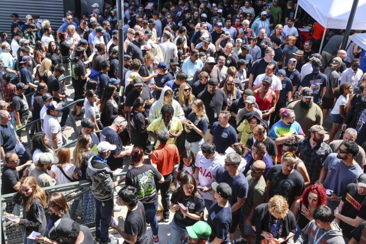 Thousands of Boeing machinists make their way to the exits to cast their vote after the &quot;stop work meeting&quot; and strike sanction at T-Mobile Park in Seattle, July 17, 2024.