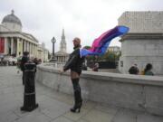 Ed Willcox, one of the participants in the artwork &ldquo;Mil Veces un Instante (A Thousand Times in an Instant)&rdquo; created by Mexican artist Teresa Margolles, poses for a photograph Wednesday on the Fourth Plinth, marking 25 years of the ground-breaking commissioning programme for public art at Trafalgar Square, in London.