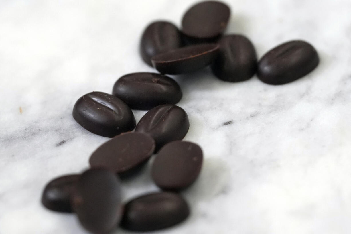 Chocolate callets are displayed at the California Cultured office in West Sacramento, Calif., Wednesday, Aug. 28, 2024.