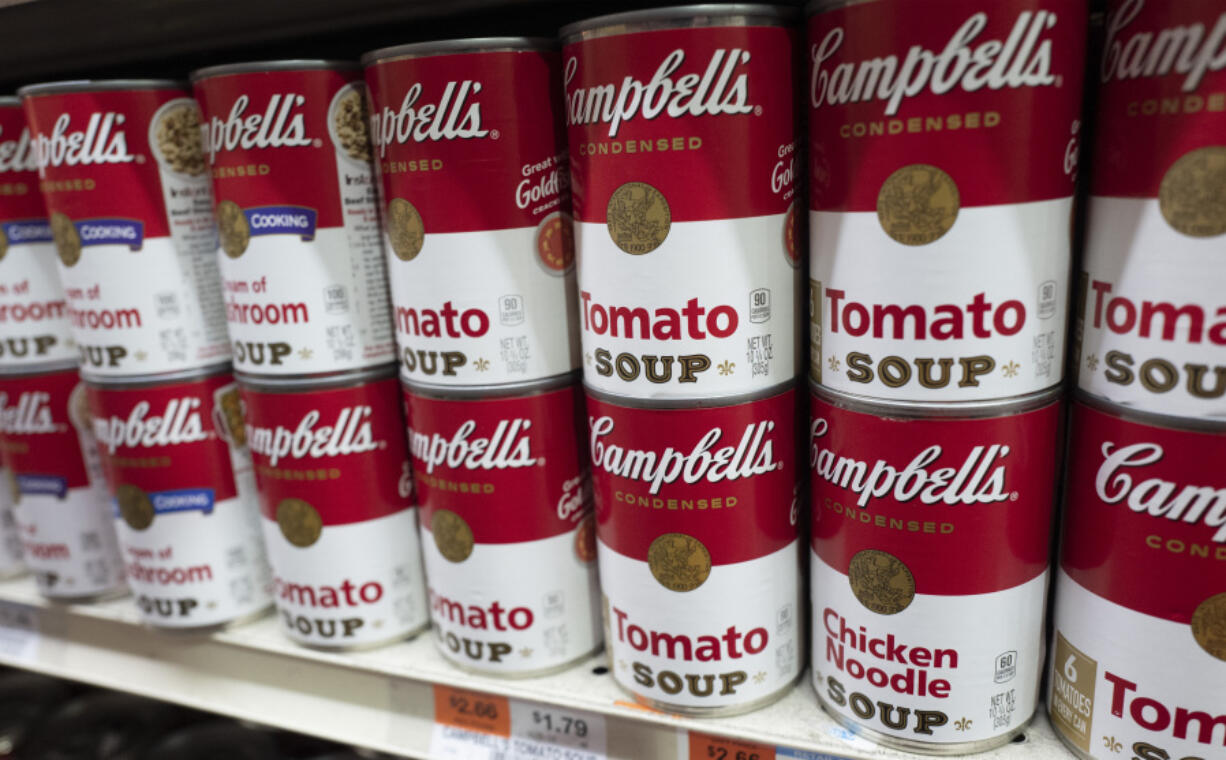 Cans of Campbell&#039;s soup are displayed in a supermarket on March 25, 2021, in New York.