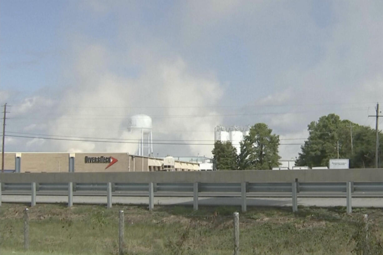 In this image taken from video from WSB-TV, smoke rises from the roof of a BioLab plant, Sunday, Sept. 29, 2024, in Conyers, Ga.