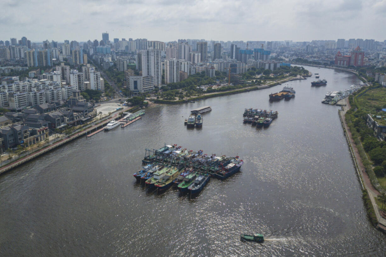 In this photo released by Xinhua News Agency, an aerial view shows boats docking near a harbor after the State Flood Control and Drought Relief Headquarters raised its emergency response for flood and typhoon prevention for Typhoon Yagi, in Haikou, south China&rsquo;s Hainan Province on Sept. 4, 2024.