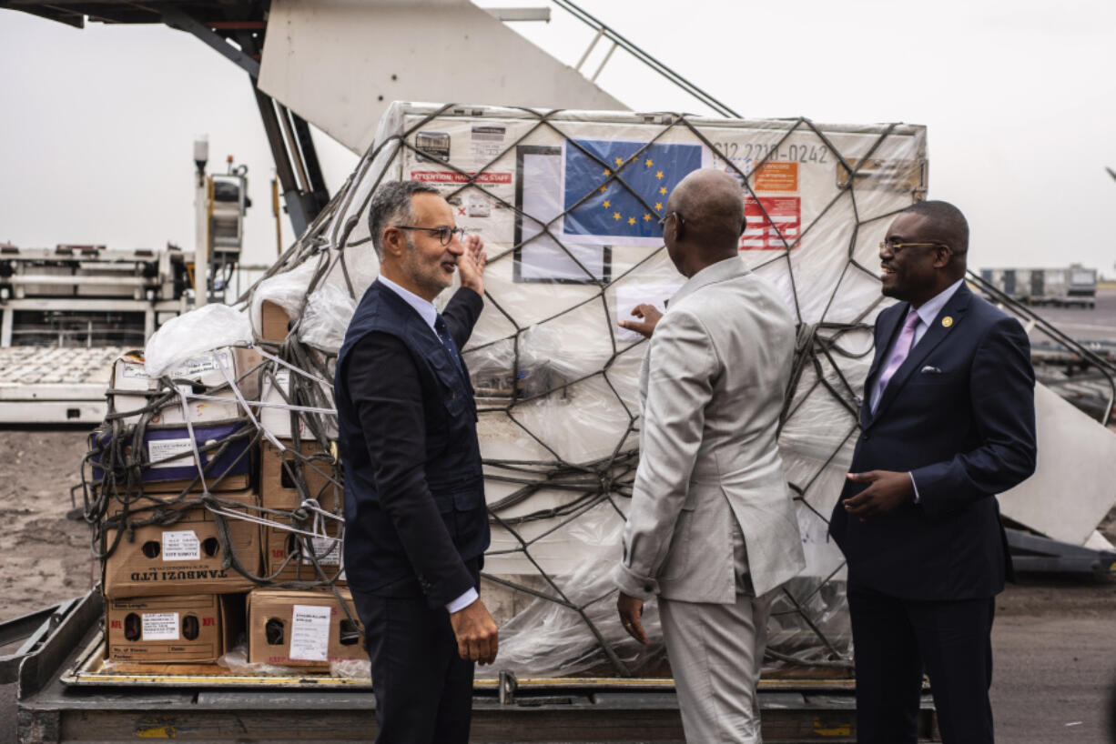 Officials check Mpox vaccine MVA-BN vaccine, manufactured by the Danish company Bavarian Nordic, at the airport in Kinshasa, Congo, Thursday, Sept. 5, 2024.