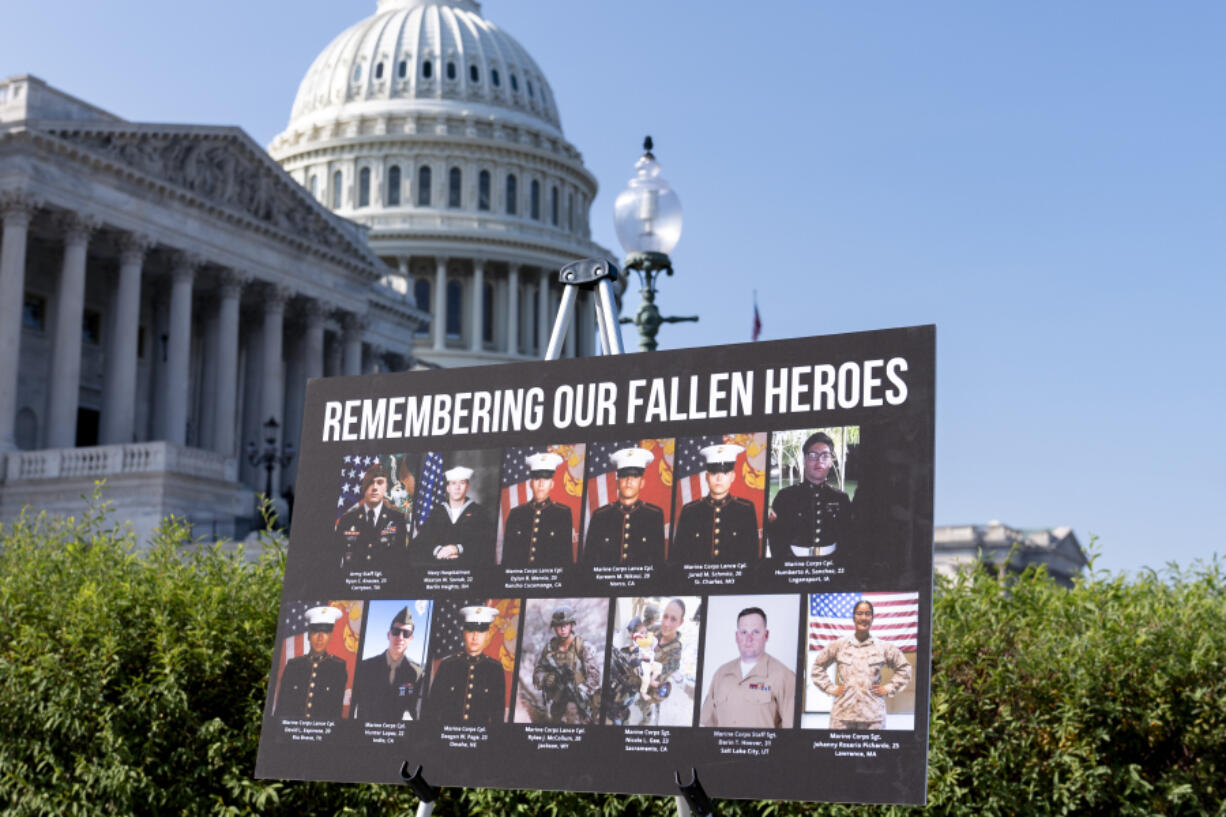 A display showing fallen American military members is displayed for a news conference by House Foreign Affairs Committee Chairman Michael McCaul, R-Texas, as he releases his panel&#039;s Afghanistan Report and the findings of its three-year investigation into the deadly U.S. withdrawal from Afghanistan, at the Capitol in Washington, Monday, Sept. 9, 2024. (AP Photo/J.