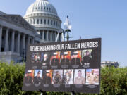 A display showing fallen American military members is displayed for a news conference by House Foreign Affairs Committee Chairman Michael McCaul, R-Texas, as he releases his panel&#039;s Afghanistan Report and the findings of its three-year investigation into the deadly U.S. withdrawal from Afghanistan, at the Capitol in Washington, Monday, Sept. 9, 2024. (AP Photo/J.