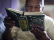 Nicaraguan exile Francisco Alvicio, a deacon of Nicaragua&rsquo;s Moravian Church, reads a Bible in his rented room in San Jose, Costa Rica, Sunday, Sept. 22, 2024.