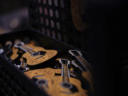 Guitar magnets are displayed at the Ryman Auditorium gift shop in Nashville, Tenn., on July 30, 2024.