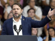 FILE - Rep. Ruben Gallego, D-Ariz., speaks before Democratic presidential nominee Vice President Kamala Harris and Democratic vice presidential nominee Minnesota Gov. Tim Walz at a campaign rally at Desert Diamond Arena, Friday, Aug. 9, 2024, in Glendale, Ariz. (AP Photo/Ross D.