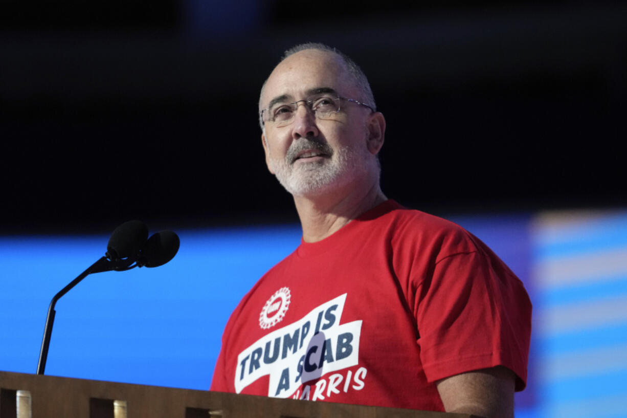 Shawn Fain, president of the United Automobile Workers, speaks during the Democratic National Convention Monday, Aug. 19, 2024, in Chicago.