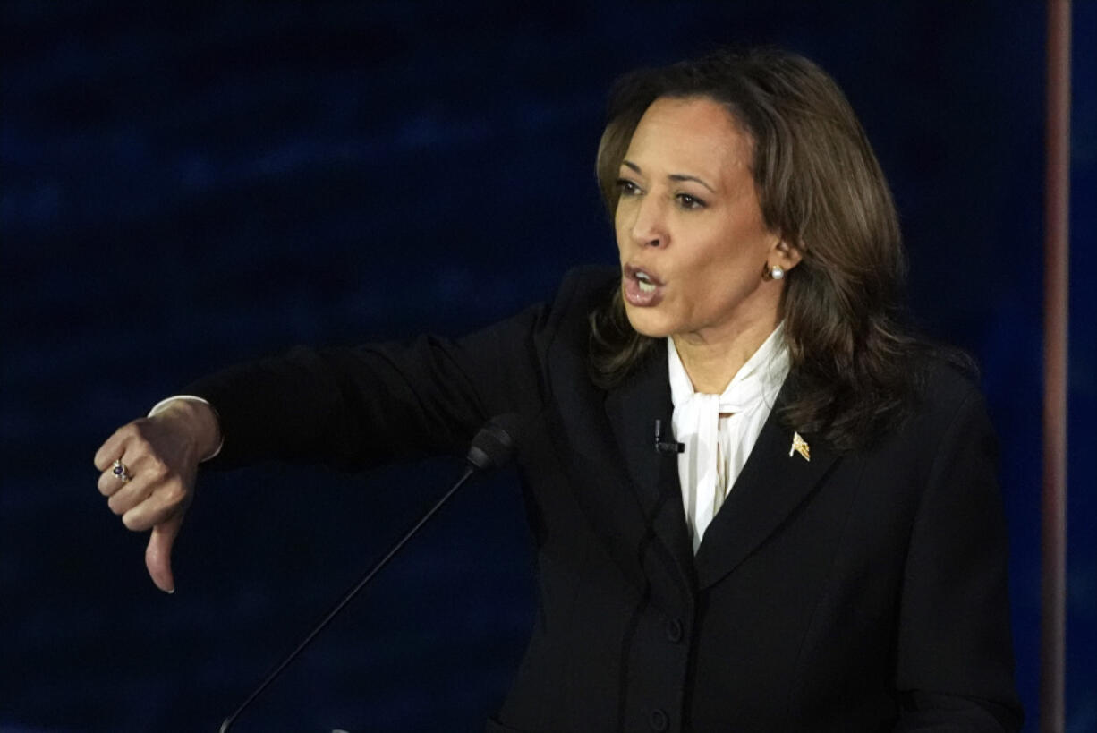 Democratic presidential nominee Vice President Kamala Harris gestures as she speaks during a presidential debate with Republican presidential nominee former President Donald Trump at the National Constitution Center, Tuesday, Sept.10, 2024, in Philadelphia.