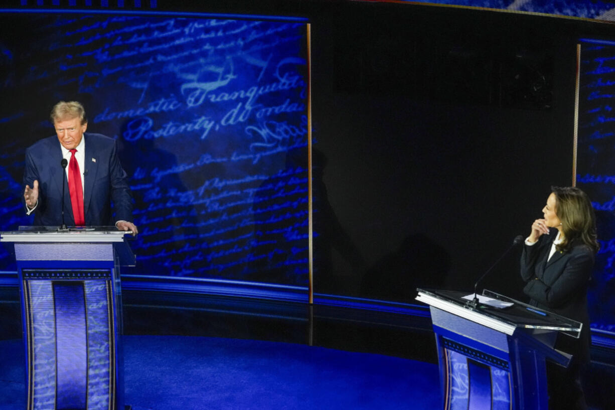 Republican presidential nominee former President Donald Trump and Democratic presidential nominee Vice President Kamala Harris participate during an ABC News presidential debate at the National Constitution Center in Philadelphia, Tuesday, Sept. 10, 2024.