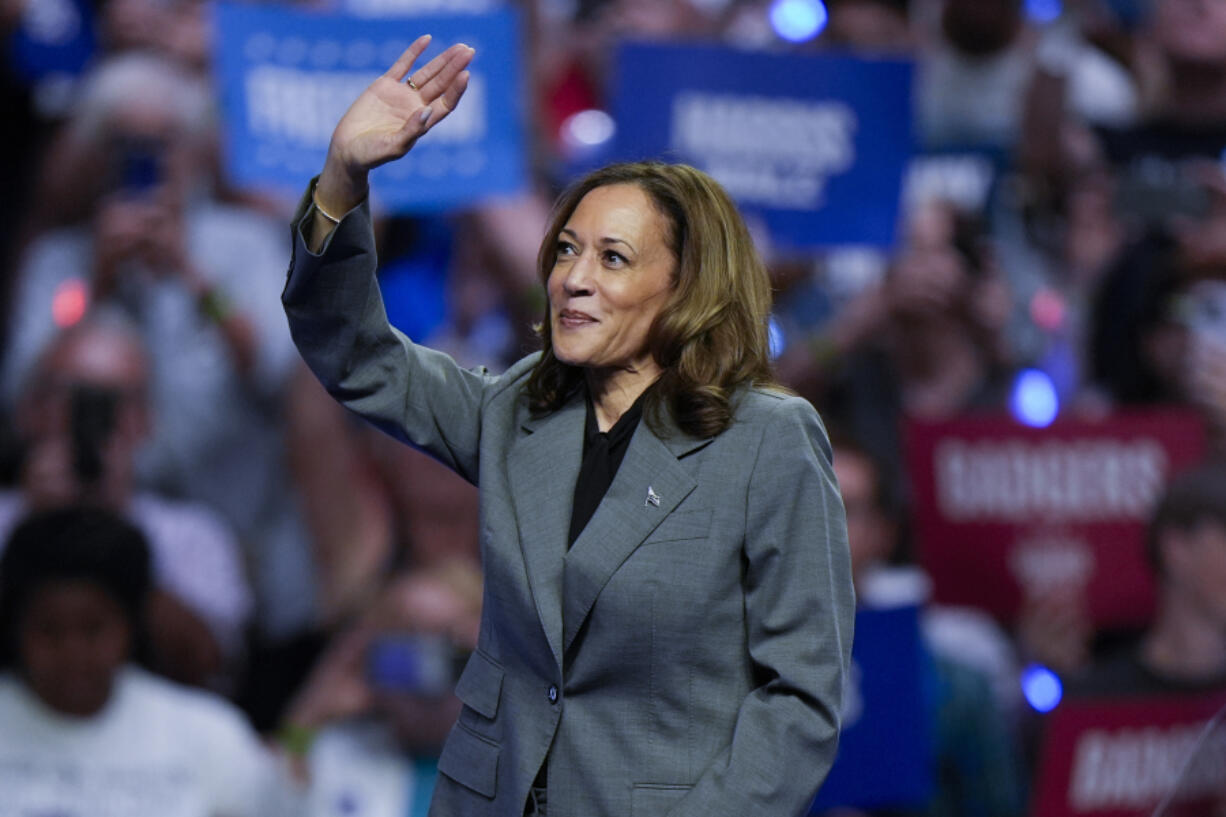 Democratic presidential nominee Vice President Kamala Harris waves to supporters at a campaign event Friday, Sept. 20, 2024, in Madison, Wis.