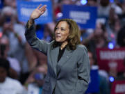 Democratic presidential nominee Vice President Kamala Harris waves to supporters at a campaign event Friday, Sept. 20, 2024, in Madison, Wis.