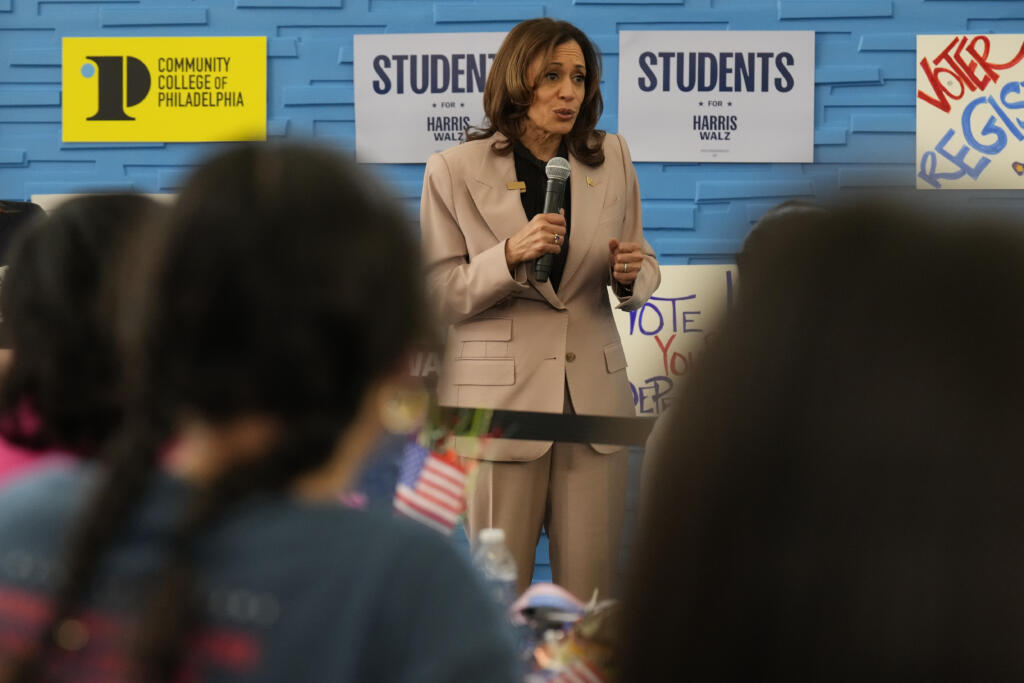 Democratic presidential nominee, Vice President Kamala Harris, center, speaking during an unscheduled stop to talk to student volunteers at Community College of Philadelphia, Tuesday, Sept. 17, 2024, in Philadelphia.