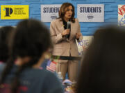 Democratic presidential nominee, Vice President Kamala Harris, center, speaking during an unscheduled stop to talk to student volunteers at Community College of Philadelphia, Tuesday, Sept. 17, 2024, in Philadelphia.