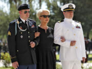 FILE - Cindy McCain, escorted by sons, Jack McCain, right, and Jimmy McCain, follow behind military personal carrying the casket of Sen. John McCain, R-Ariz., into the Capitol rotunda for a memorial service, Aug. 29, 2018, at the Capitol in Phoenix. Jimmy McCain has registered as a Democrat and will vote for Kamala Harris for President in 2024.