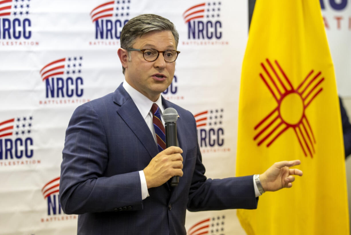 House Speaker Mike Johnson talks to attendees of a campaign event for Republican U.S. House candidate Yvette Herrell of New Mexico in Las Cruces, N.M., Wednesday, Aug. 21, 2024.