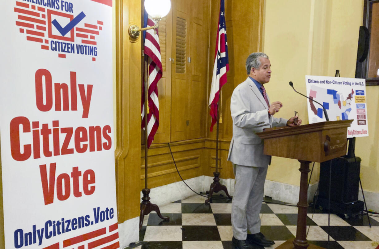 FILE - Luis Gil, a Republican candidate for Franklin County Commissioner in central Ohio, speaks in favor of a constitutional amendment on fall ballots that would prohibit noncitizen voting at the Ohio Statehouse in Columbus, Ohio, on, Oct. 6, 2022.