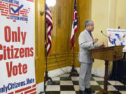 FILE - Luis Gil, a Republican candidate for Franklin County Commissioner in central Ohio, speaks in favor of a constitutional amendment on fall ballots that would prohibit noncitizen voting at the Ohio Statehouse in Columbus, Ohio, on, Oct. 6, 2022.