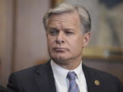 FBI Director Christopher Wray listens during a meeting of the Justice Department&#039;s Election Threats Task Force at the Department of Justice, Wednesday, Sept. 4, 2024, in Washington.