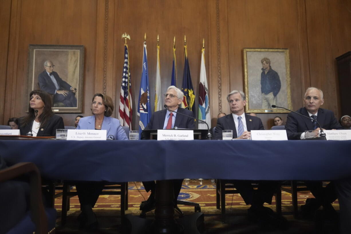 Attorney General Merrick Garland, center, speaks before a meeting of the Justice Department&rsquo;s Election Threats Task Force, at the Department of Justice, Wednesday, Sept. 4, 2024, in Washington, with from left, Deputy Attorney General, Criminal Division, Nicole Argentieri, Deputy Attorney General Lisa Monaco, Garland, FBI Director Christopher Wray and Assistant Attorney General, National Security Division, Matthew Olsen.