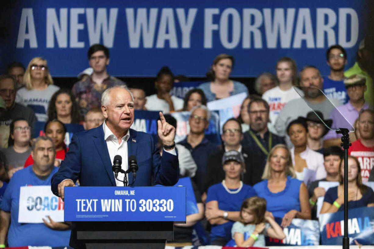 FILE - Democratic vice presidential nominee Minnesota Gov. Tim Walz speaks at a campaign rally, Aug. 17, 2024, at The Astro in La Vista, Neb.