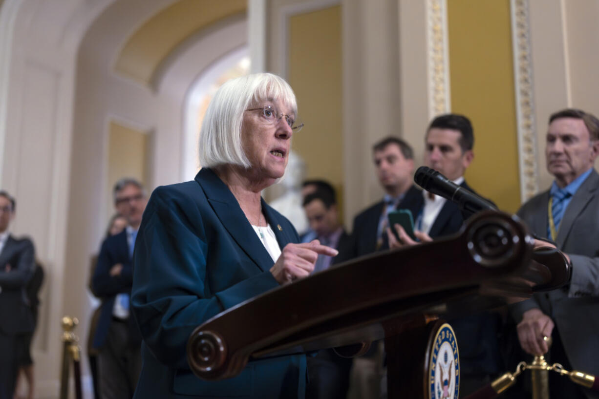 Sen. Patty Murray, D-Wash., talk to reporters before votes on a Democratic resolution stating that every patient has the basic right to emergency health care, including abortion care, regardless of where they live, at the Capitol in Washington, Tuesday, Sept. 24, 2024. (AP Photo/J.