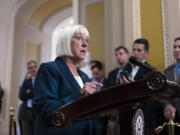 Sen. Patty Murray, D-Wash., talk to reporters before votes on a Democratic resolution stating that every patient has the basic right to emergency health care, including abortion care, regardless of where they live, at the Capitol in Washington, Tuesday, Sept. 24, 2024. (AP Photo/J.