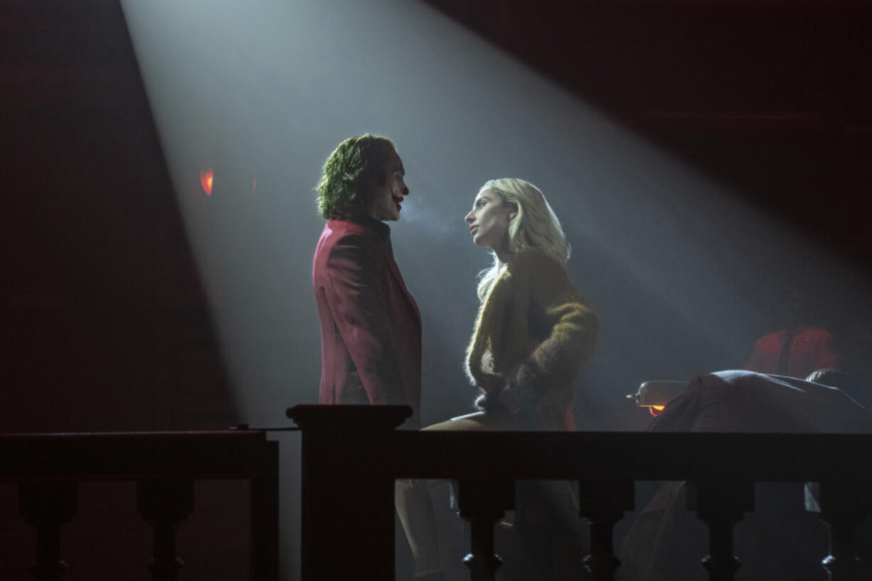 Joaquin Phoenix, left, and Lady Gaga in &ldquo;Joker: Folie &agrave; Deux.&rdquo; (Niko Tavernise/Warner Bros.