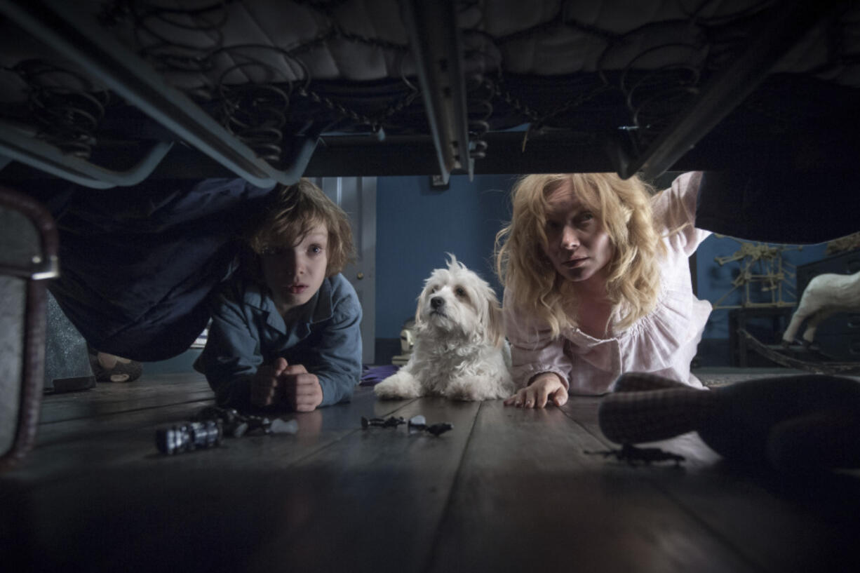 Noah Wiseman, left, and Essie Davis perform in a scene from &ldquo;The Babadook.&rdquo; (IFC Films)