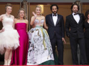 Julianne Forde, from left, Ruth Treacy, Maria Bakalova, director Ali Abbasi, Sebastian Stan and Amy Baer pose for photographers May 20 upon arrival at the premiere of the film &ldquo;The Apprentice&rdquo; at the 77th international film festival, Cannes, southern France.