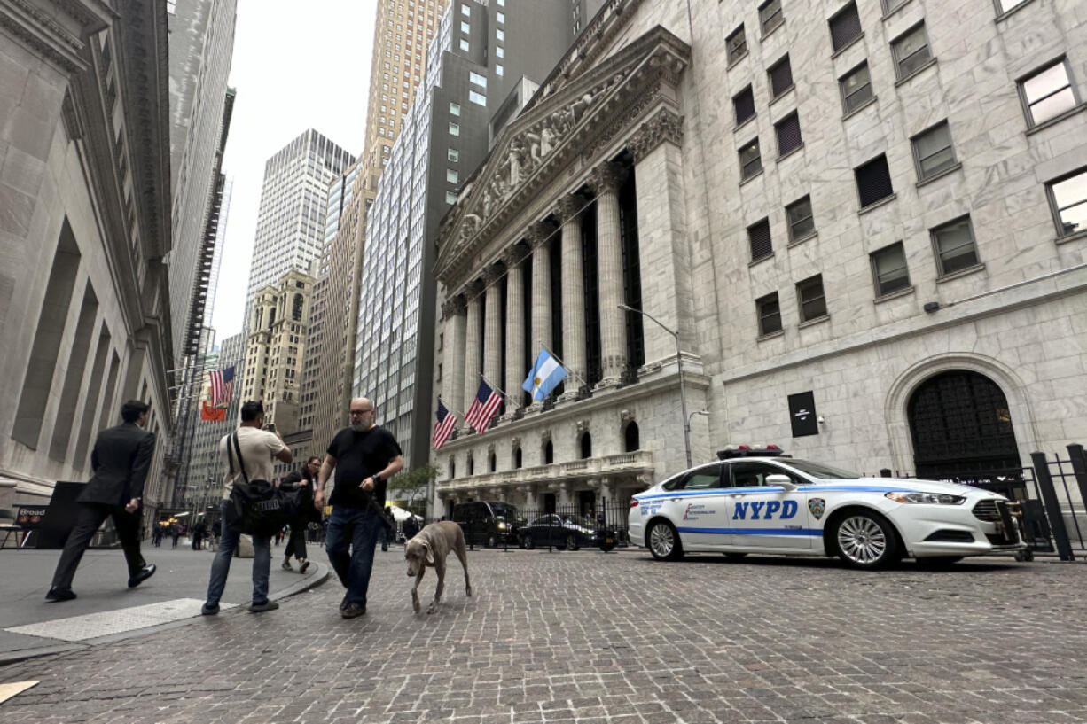 The flag of Argentina flies on the front of the New York Stock Exchange where Argentine President Javier Milei will ring the opening bell on Monday, Sept. 23, 2024, in New York.